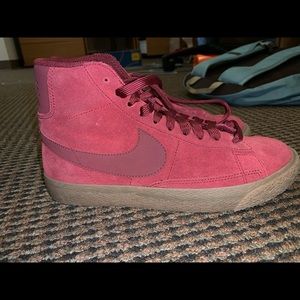 Red Nike high top suede sneakers